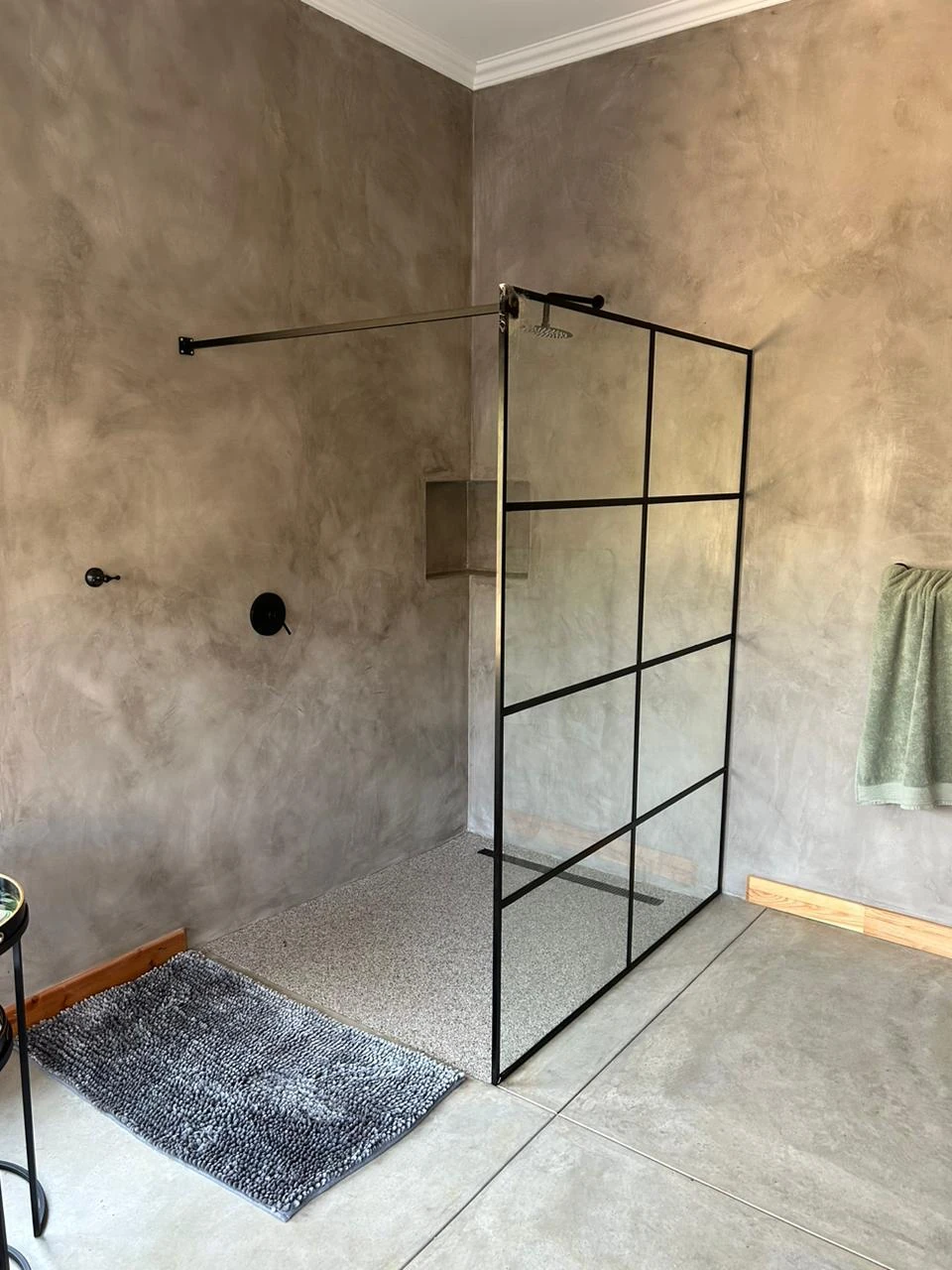 Frameless toughened glass shower enclosure